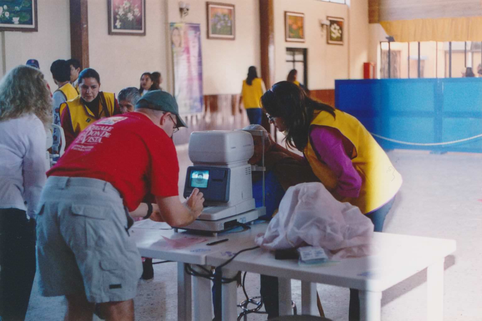 Dan testing a patient's eyes in Mexico.